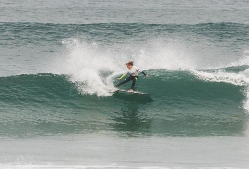 Tom Hook all the way from Guernsey 'hooking' a carve in